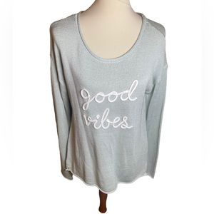 Marked Sweater with ‘Good Vibes’ on the Front